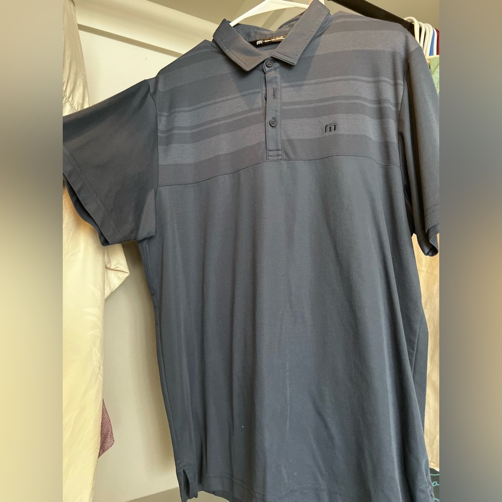 Travis Mathew’s.  Great condition. Blue polo.